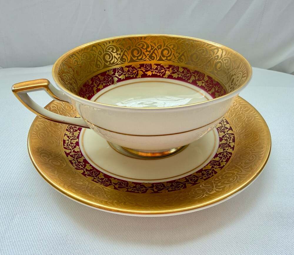 Fretlau Bavaria Germany Echt Ategold Gold Encrusted and Burgundy Teacup and Sauc